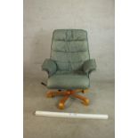 A late 20th century Scandinavian Stressles style grey/blue leather chair with footstool, the chair