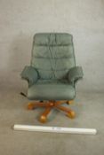 A late 20th century Scandinavian Stressles style grey/blue leather chair with footstool, the chair