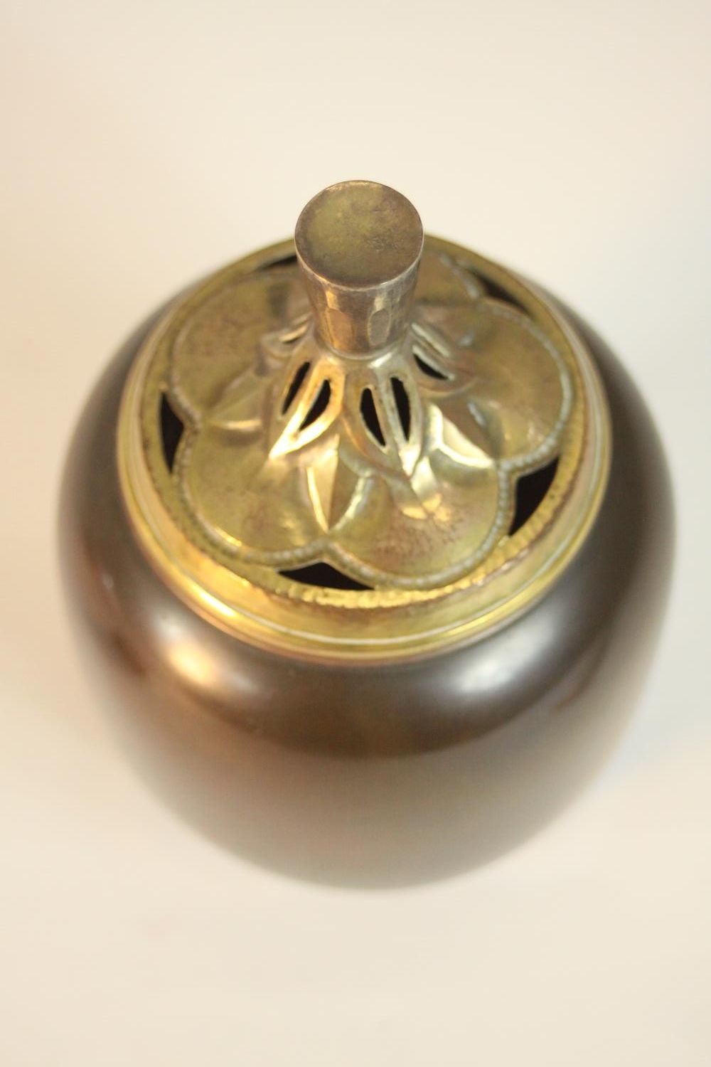 A Japanese bronze incense burner with gilded pierced lid in the form of a fruit on three splayed - Image 6 of 8