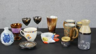 A collection of ceramics and glass, including pieces of Quimper china with tube lined designs, a