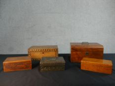 A collection of five marquetry and carved boxes, two jewellery boxes with lift out trays and a