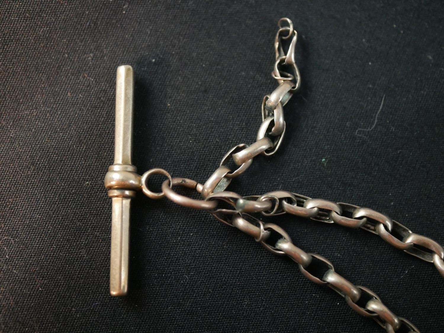 A Victorian hollow rolled rose gold watch chain with albert clasp and T-bar. Gross weight 18.94g - Image 3 of 5