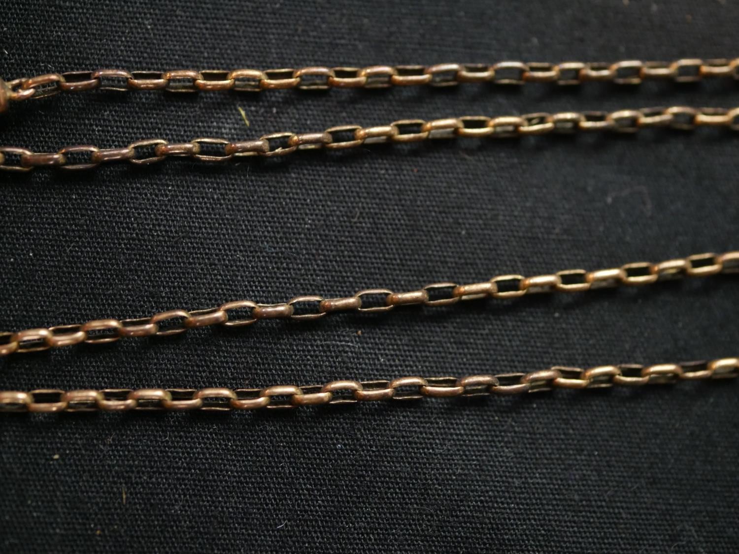 Three 9ct gold chain necklaces, including a 9ct box chain with gilded jade bar pendant, a 9ct gold - Image 9 of 13