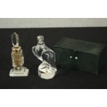 A Holmegaard crystal eagle along with a silver collared etched floral design scent bottle with