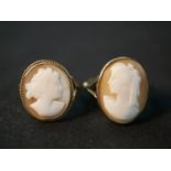 Two 9ct gold carved shell cameo dress rings, each of a classical female side portrait. One with a