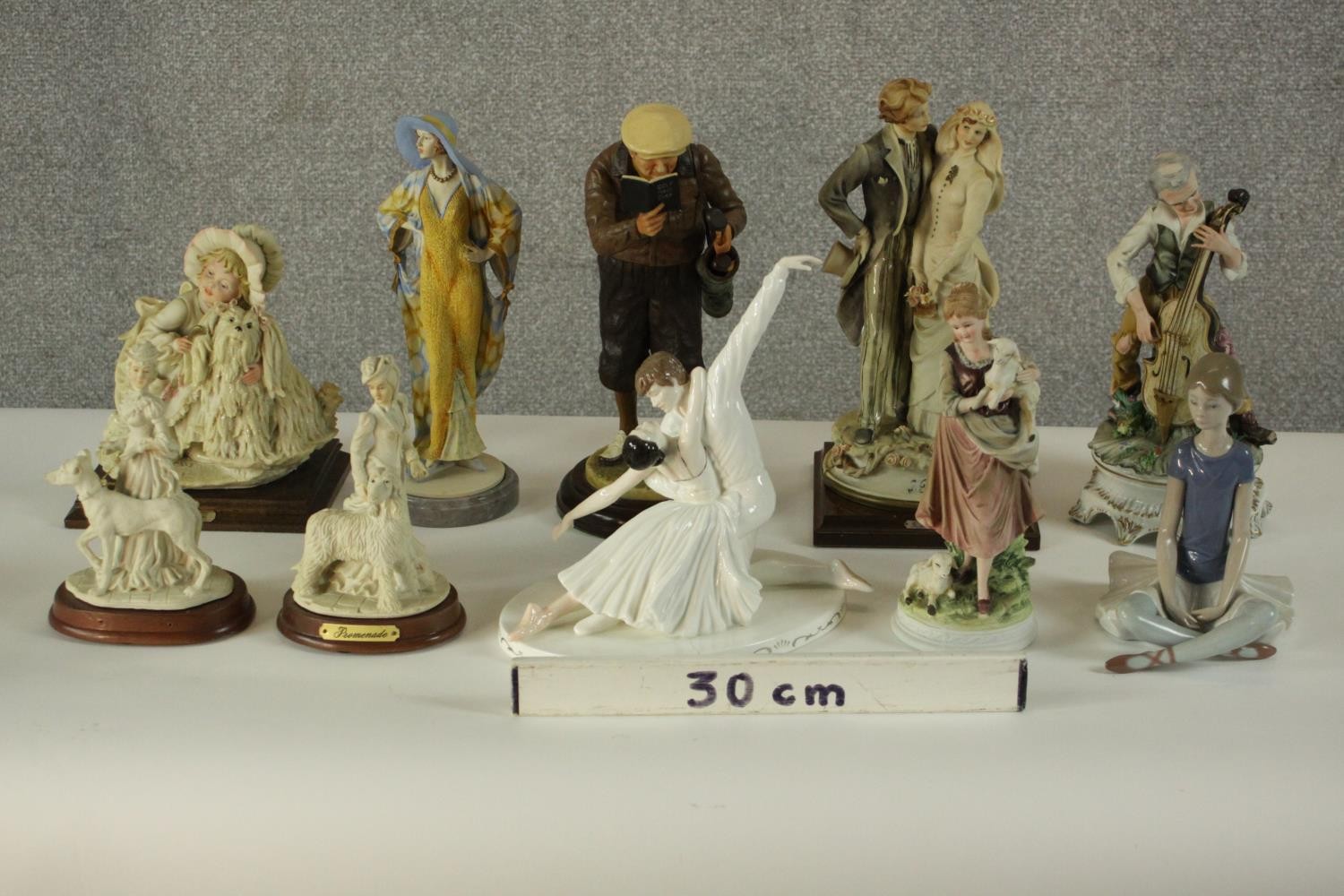 A collection of ten hand painted porcelain figures by various makers. Figures include a Lladro - Image 2 of 15