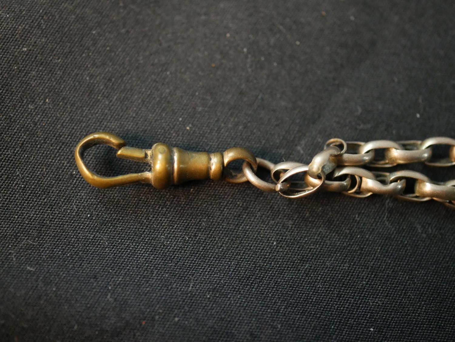 A Victorian hollow rolled rose gold watch chain with albert clasp and T-bar. Gross weight 18.94g - Image 4 of 5