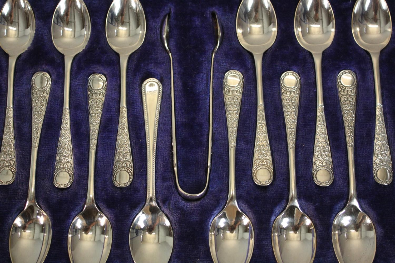 A leather cased set of coffee spoons and sugar tongs by Walker and Hall along with a cased set of - Image 3 of 9