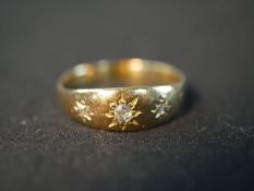 A Victorian 18 carat diamond gypsy ring, the ring set with three oval old mine diamonds in star