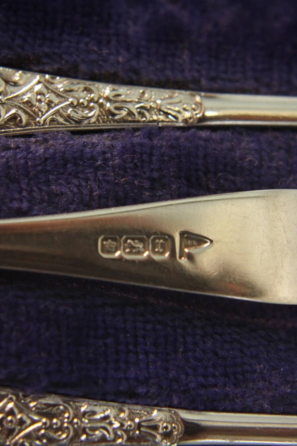 A leather cased set of coffee spoons and sugar tongs by Walker and Hall along with a cased set of - Image 5 of 9