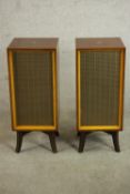 A pair of mid 20th century His Master's Voice DLS 519 speakers, with walnut cases on splayed legs.