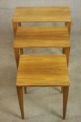 A Gordon Russell of Broadway teak nest of three tables, of rectangular form on tapering legs,