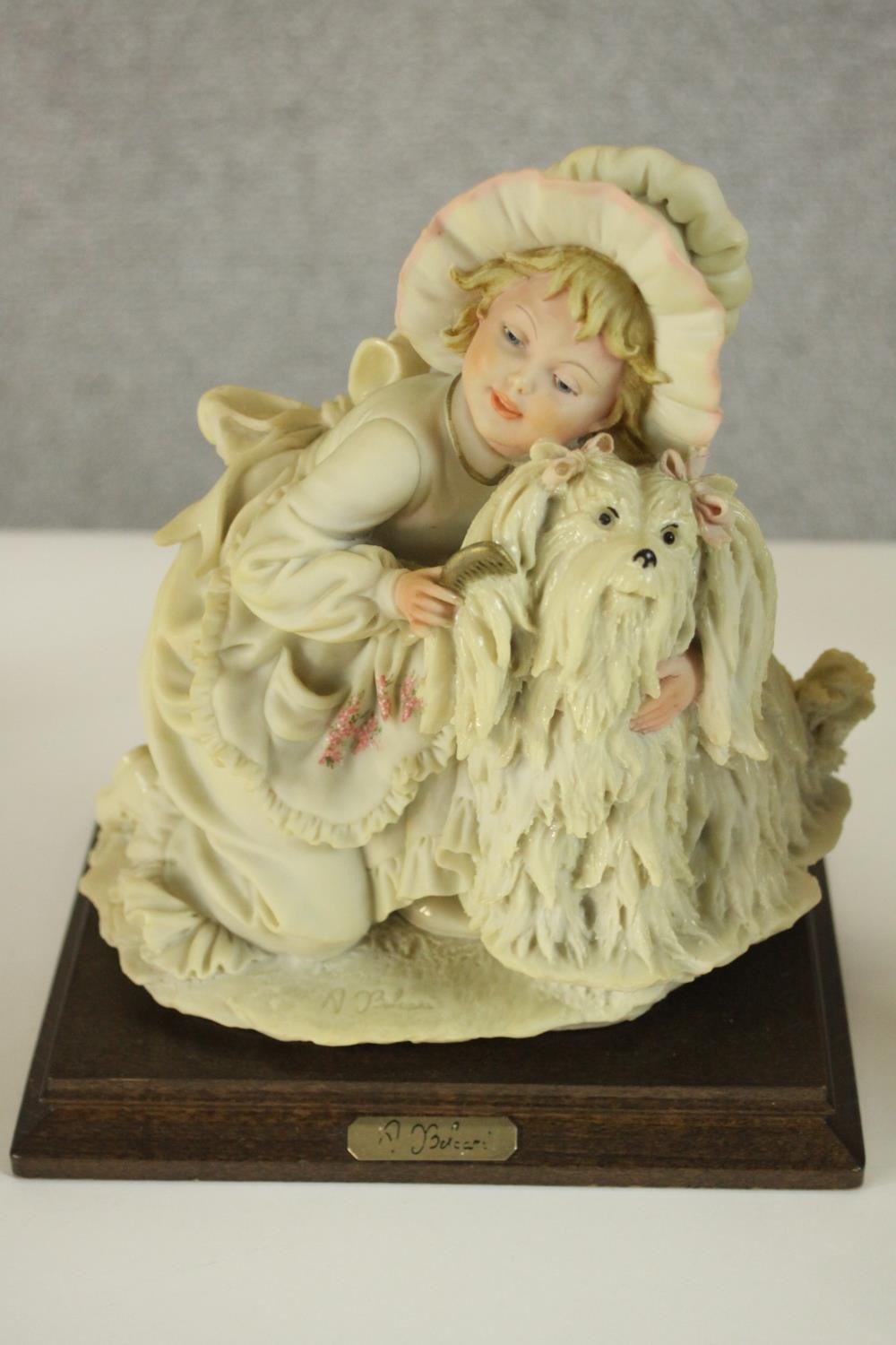 A collection of ten hand painted porcelain figures by various makers. Figures include a Lladro - Image 8 of 15