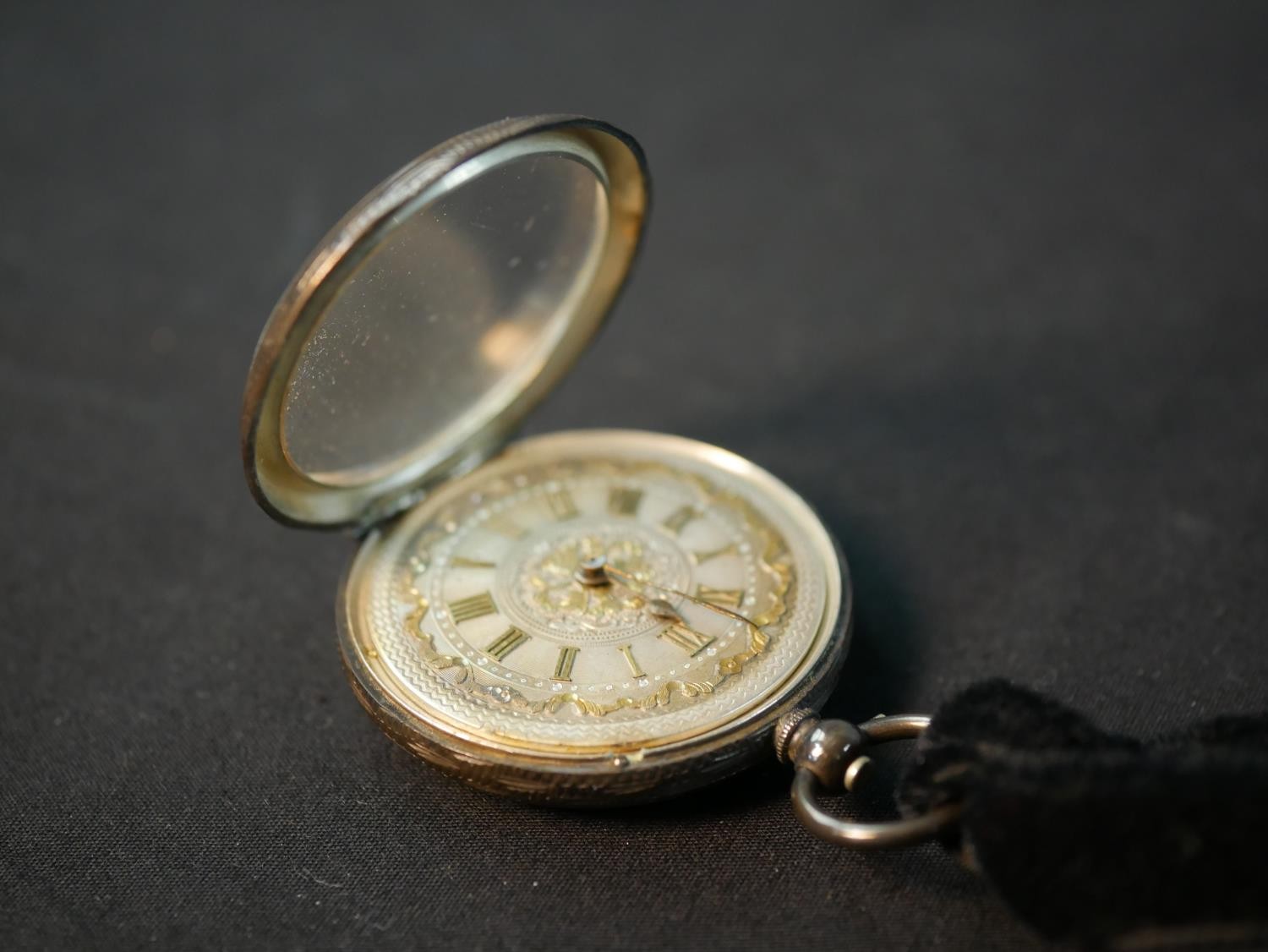 A silver carved and engraved Swiss fob watch. The dial with a carved fruit basket and foliate design - Image 4 of 9