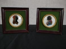 Two framed hand painted silhouettes on glass of Lady Hamilton and Lord Nelson within gilt metal