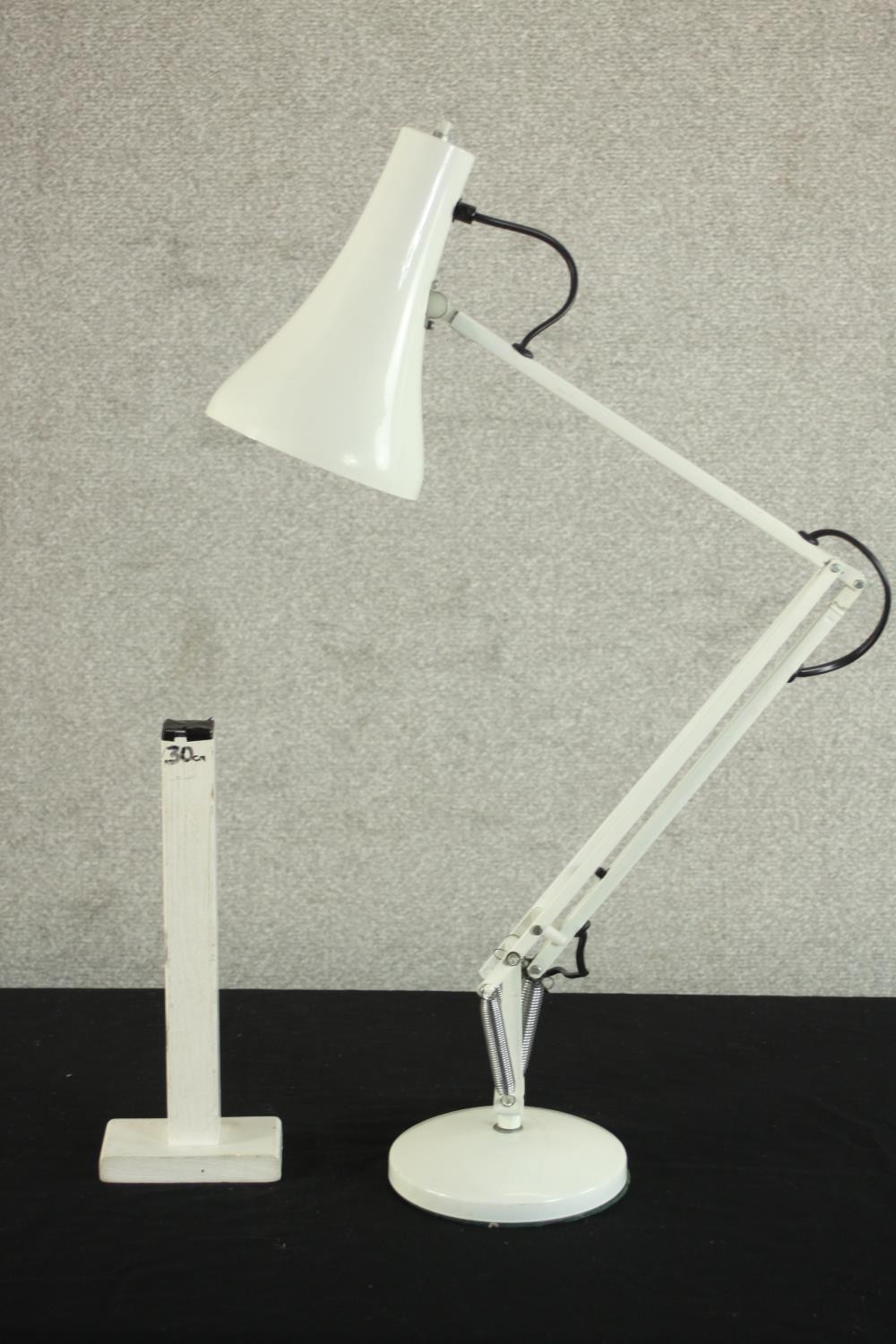 A mid 20th century Herbert Terry style anglepoise desk lamp, in white with a circular base. H.85 - Image 2 of 7