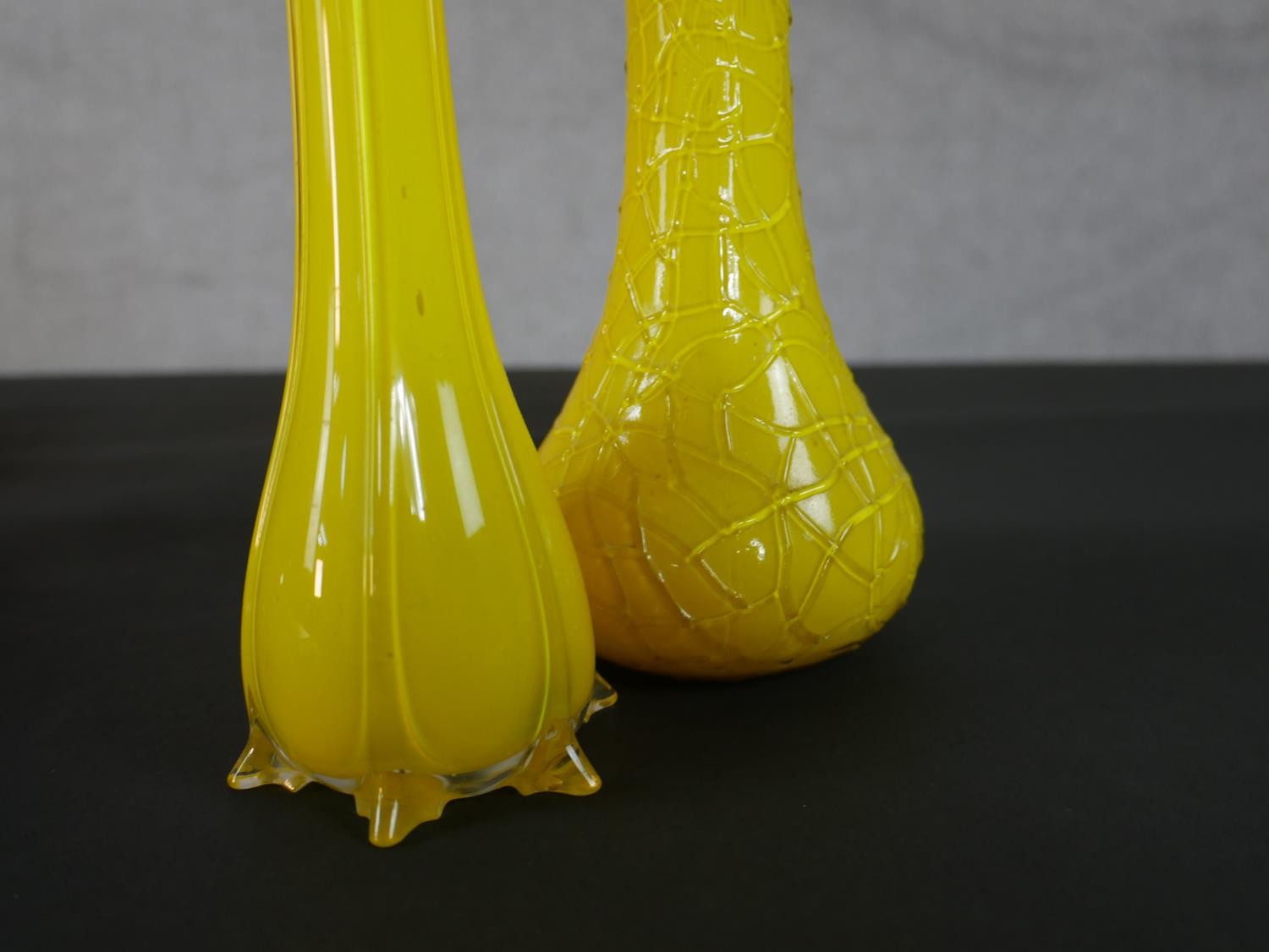 A collection of vintage and antique glass vases. Including two vintage opaque yellow glass vases and - Image 2 of 3