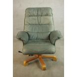 A late 20th century Scandinavian Stressles style grey/blue leather chair, on a five point base. H.