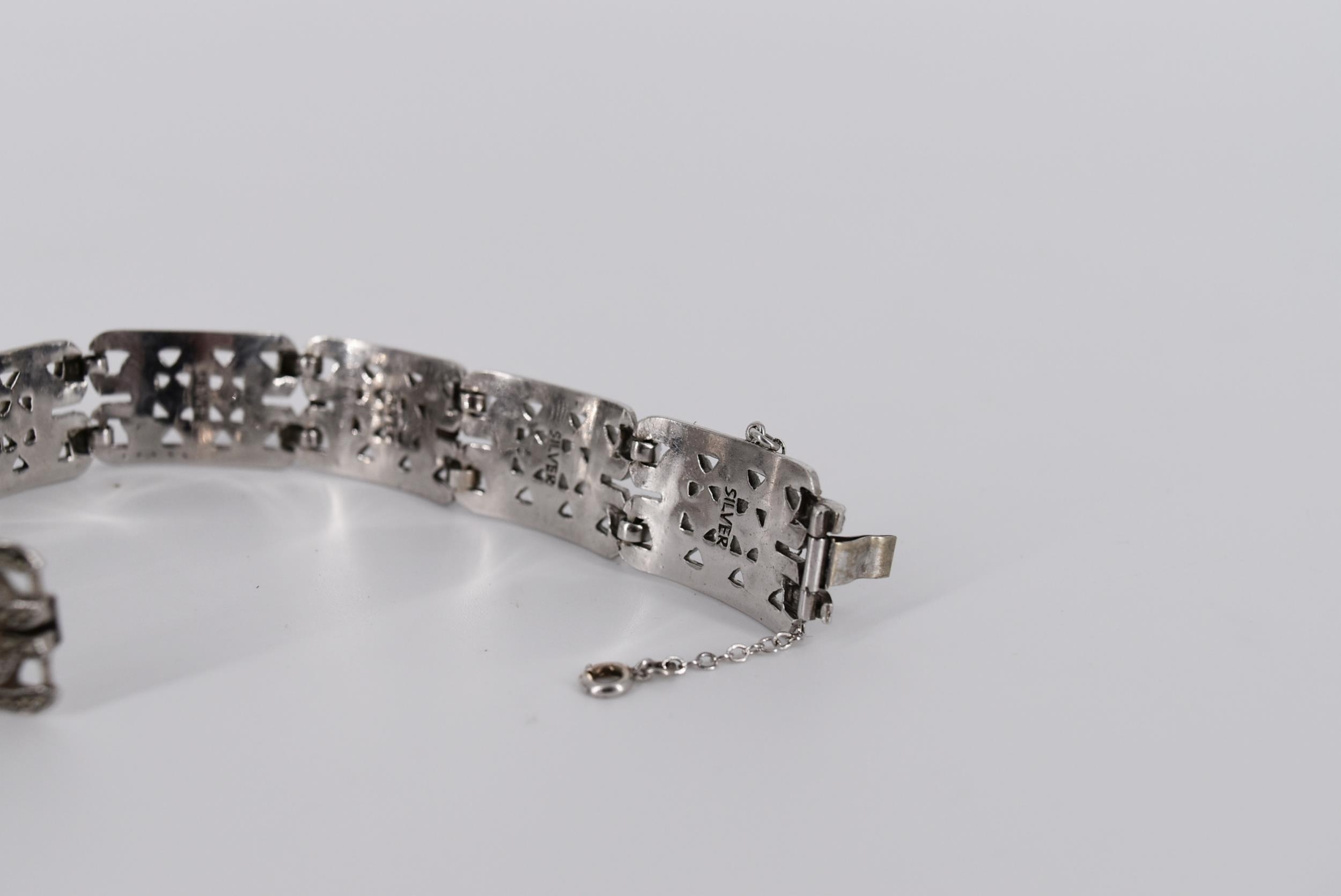 A boxed Art Deco marcasite and silver pierced geometric design bracelet with safety chain. Stamped - Image 6 of 6