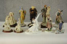 A collection of ten hand painted porcelain figures by various makers. Figures include a Lladro