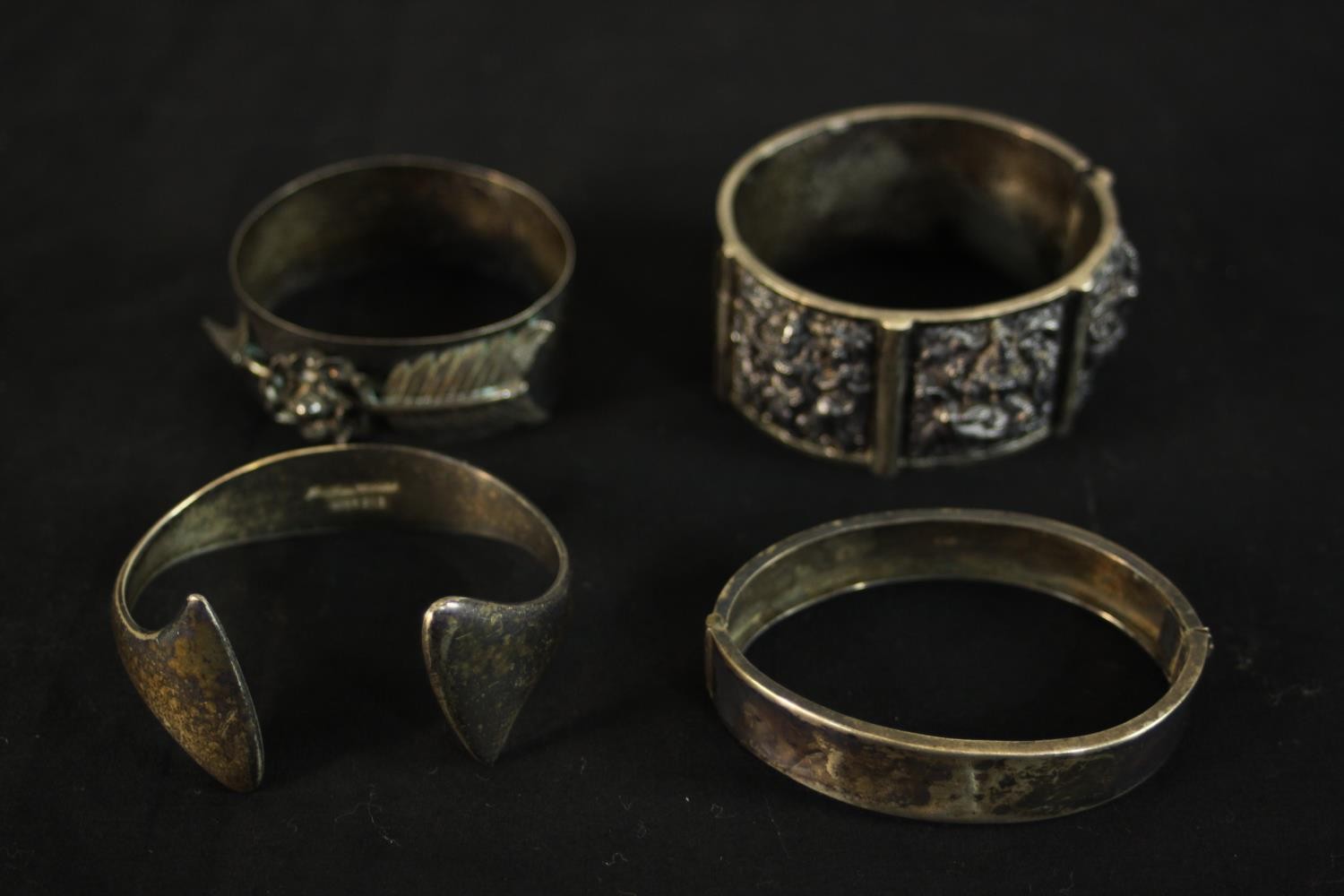 Four silver and white metal bangles (tested as silver), including a Hans Hansen abstract form torque - Image 2 of 11