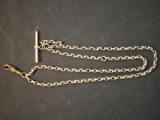 A Victorian hollow rolled rose gold watch chain with albert clasp and T-bar. Gross weight 18.94g