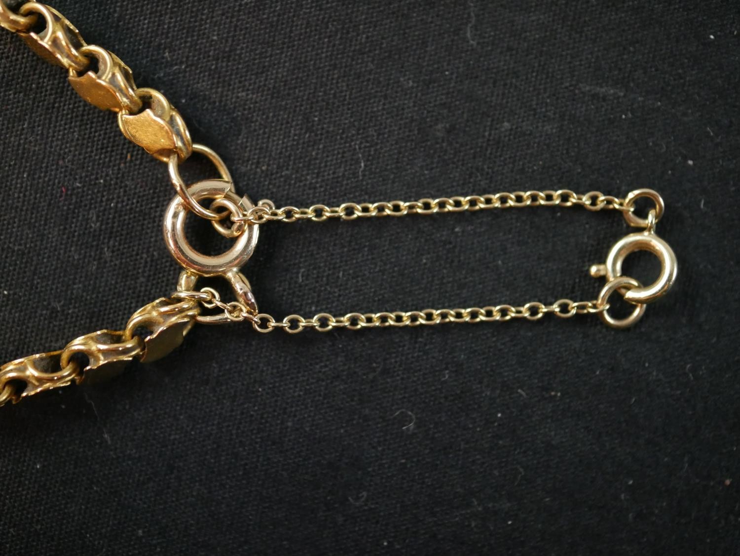 A 16 inch fancy s-link yellow metal (tests as 14ct) chain with a pair of matching earrings. The - Image 6 of 8