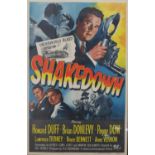 A 1950s Shakedown film poster, directed by Joe Pevney, starring Howard Duff, Brian Donlevy and Peggy