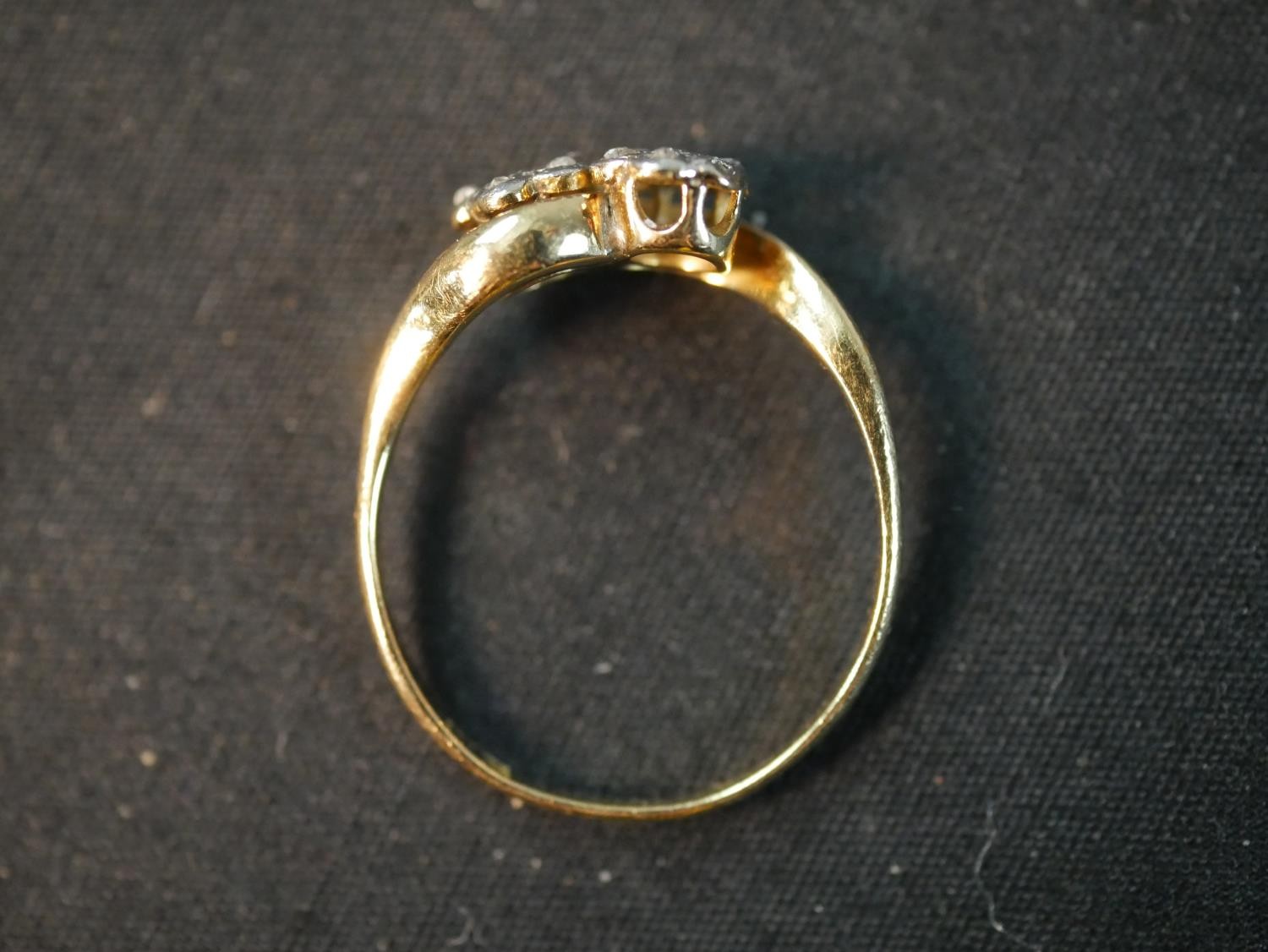 An Edwardian yellow metal (tests higher than 9ct) and rose cut diamond floral cross over ring, - Image 5 of 6