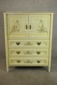 A late 20th century Chinese inspired painted cabinet, with faux bamboo detail, cream painted with