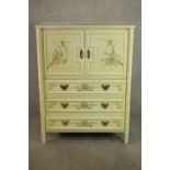 A late 20th century Chinese inspired painted cabinet, with faux bamboo detail, cream painted with