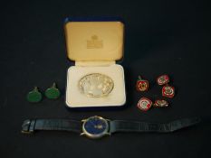 A collection of MCC accessories, including two pairs of MCC logo cufflinks, an MCC gentleman's