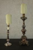 Two repousse silver plated candlesticks converted into table lamps. H.57 W.15 D.15cm. (largest)