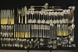 A large collection of silver plate cutlery, includes sets of forks and spoons, various serving