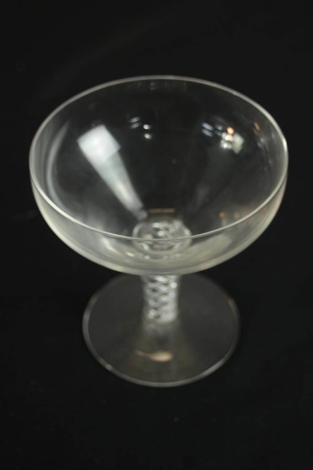 A set of twelve clear glass air twist stem champagne coupes. H.20 Dia.10cm. (largest) - Image 4 of 6