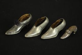 Four silver and silver plate early 20th century shoe pin cushions. The silver one with bow detailing