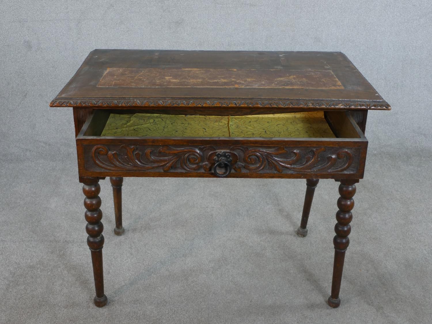 A Victorian carved oak lowboy, the top with a brown leather insert and a carved moulded edge over - Image 4 of 8