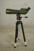 An Optolyth German spotting scope with Slik adjustable tripod. H.178 W.45 D.1ocm.