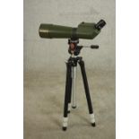 An Optolyth German spotting scope with Slik adjustable tripod. H.178 W.45 D.1ocm.