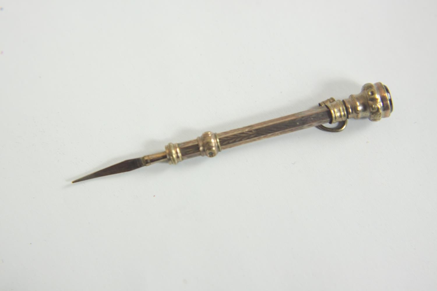 A leather cased rolled gold engraved 19th century retractable tooth pick with a garnet set to the - Image 17 of 17