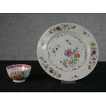 An 18th century Chinese export Famille Rose plate with floral design along with a matching lotus