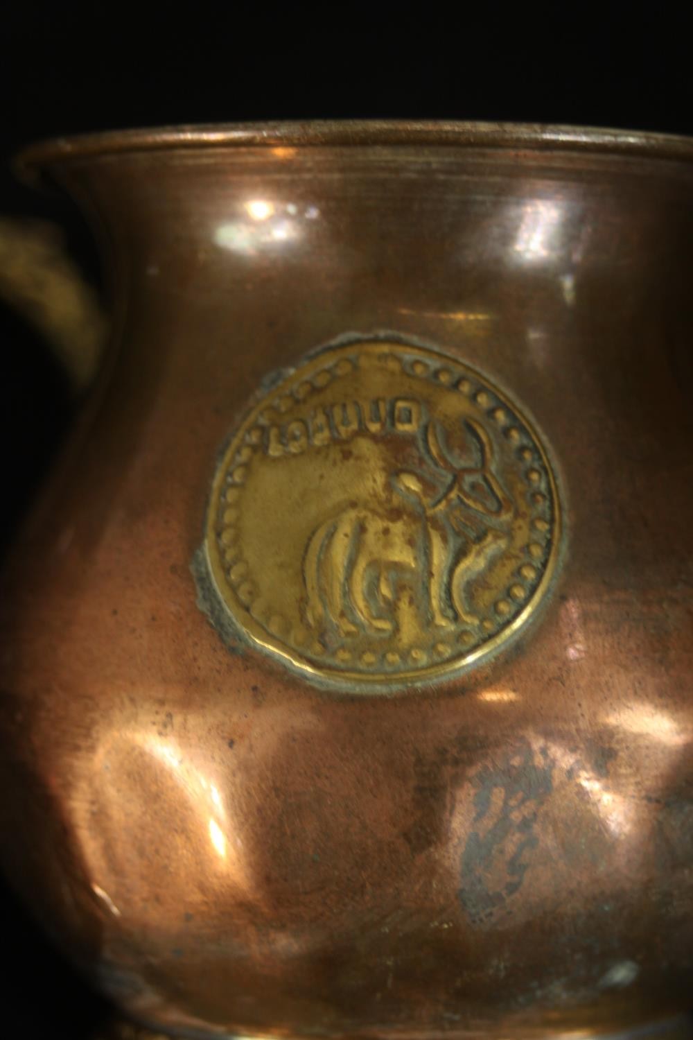 A three piece Indian brass and copper tea set with matching ashtray with relief lion boss detailing. - Image 12 of 12