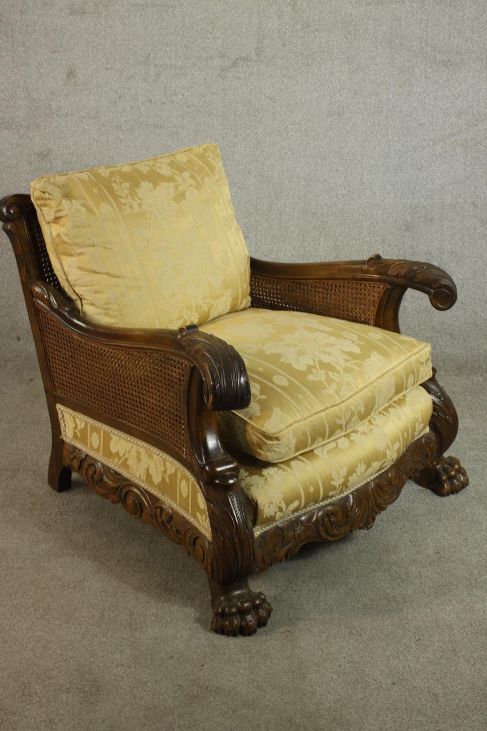 A pair of early 20th century Continental carved walnut bergere armchairs, upholstered in gold - Image 20 of 30