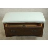 A walnut stool, made from the bottom part of a late Victorian chest of drawers or wardrobe, with