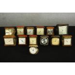 A collection of thirteen vintage cased travel clocks, makers include Europa, Estyma, Marksman and