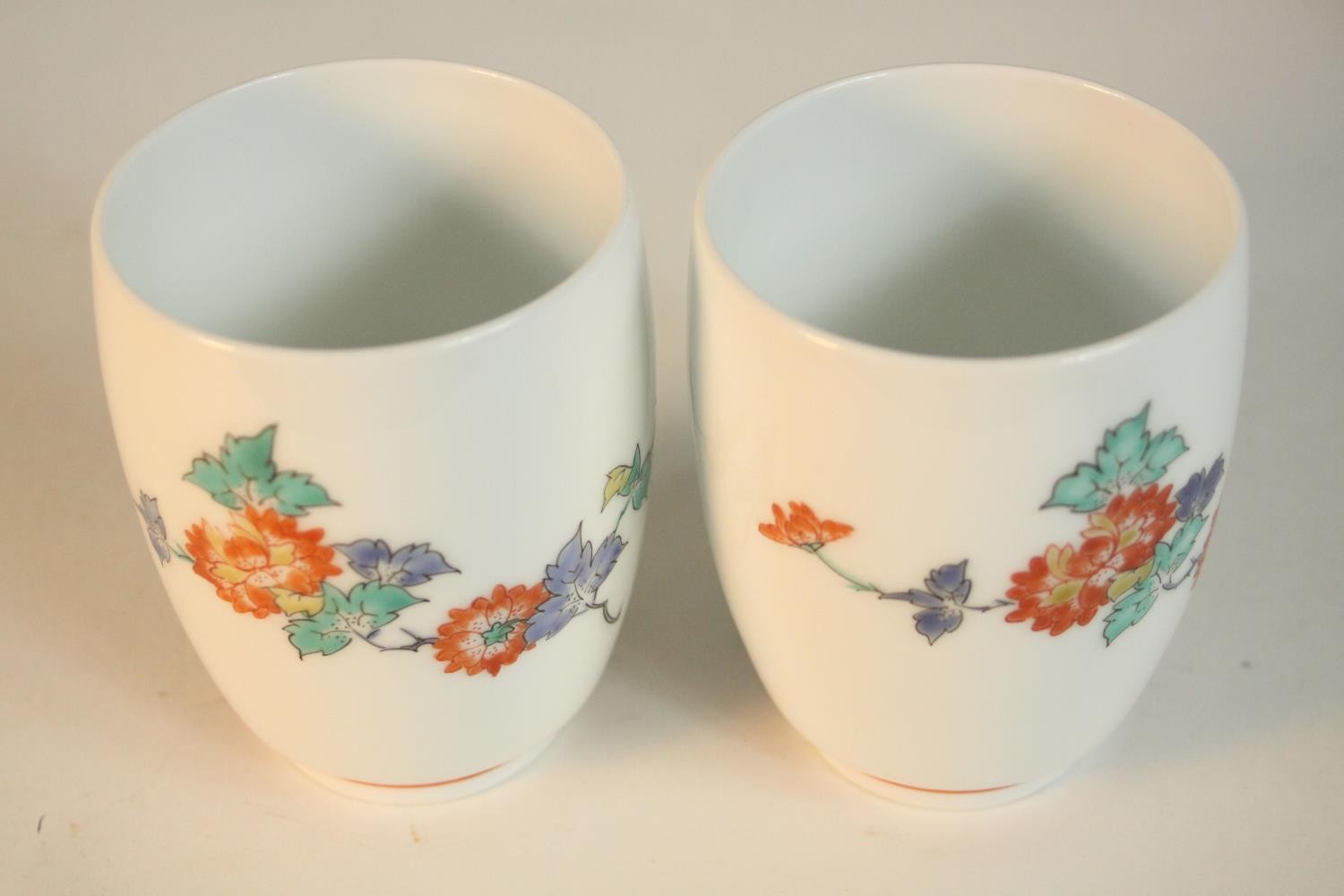 A pair of Japanese Kakiemon floral design porcelain cups, signed to base along with a pair of 19th - Image 6 of 8