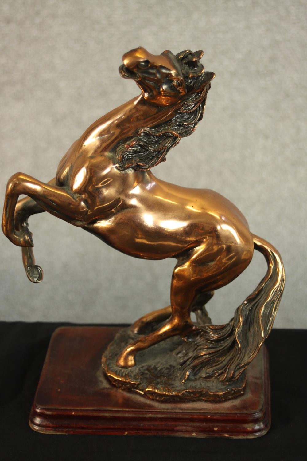 An early 20th century copper rearing horse on a mahogany base along with another brass rearing horse - Image 4 of 10