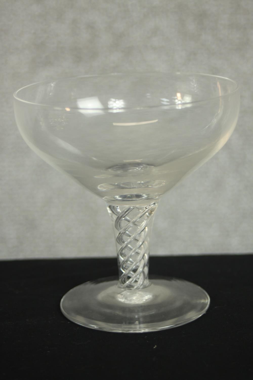 A set of twelve clear glass air twist stem champagne coupes. H.20 Dia.10cm. (largest) - Image 5 of 6