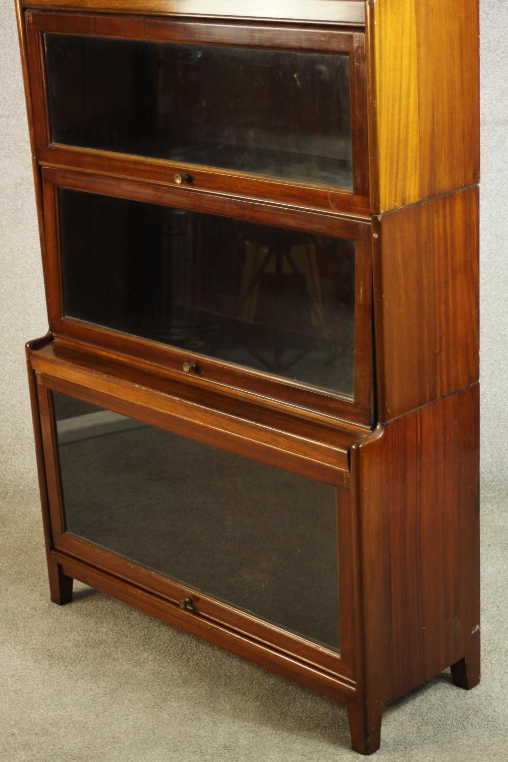 A mid 20th century mahogany Gumm stacking bookcase, with two glazed cupboard doors over three - Image 11 of 16