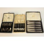 Three leather cased boxes of silver plate cutlery, including a set of six Art Deco coffee spoons